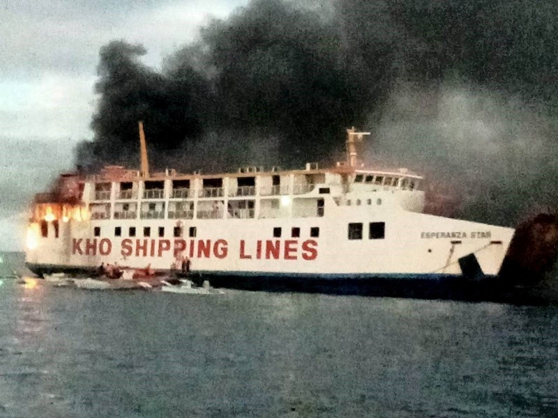 Smoke rises due to a massive fire at a ferry in Bohol, Philippines, June 18, 2023 in this handout image. Philippine Coast Guard/Handout via REUTERS    THIS IMAGE HAS BEEN SUPPLIED BY A THIRD PARTY. NO RESALES. NO ARCHIVES. MANDATORY CREDIT.