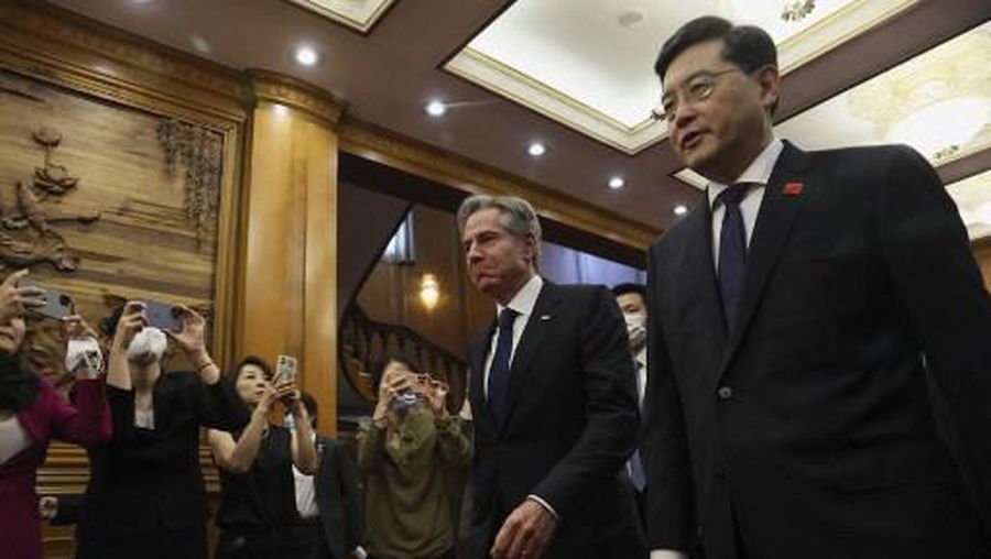US Secretary of State Antony Blinken (C) walks with China's Foreign Minister Qin Gang (R) ahead of a meeting at the Diaoyutai State Guesthouse in Beijing on June 18, 2023. (Photo by LEAH MILLIS / POOL / AFP)