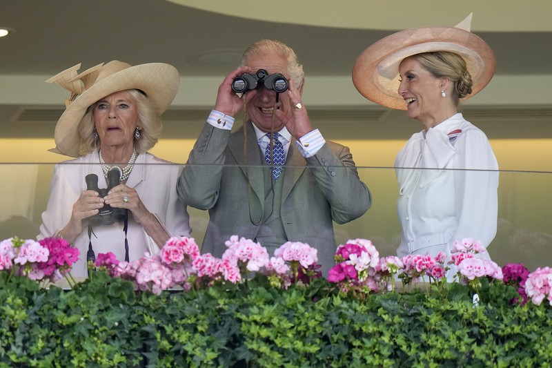 APTOPIX Britain Royal Ascot Britain's King Charles III , Camilla, the Queen Consort and Sophie, Duchess of Edinburgh, right, watch a race at day two of the Royal Ascot horse racing meeting, at Ascot Racecourse in Ascot, England, Wednesday, June 21, 2023.(AP Photo/Alastair Grant)
