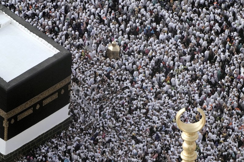 Saudi Arabia Hajj Muslim pilgrims circumambulate around the Kaaba, the cubic building at the Grand Mosque, during the annual hajj pilgrimage, in Mecca, Saudi Arabia, Thursday, June 22, 2023. Muslim pilgrims are converging on Saudi Arabia's holy city of Mecca for the largest hajj since the coronavirus pandemic severely curtailed access to one of Islam's five pillars. (AP Photo/Amr Nabil)
