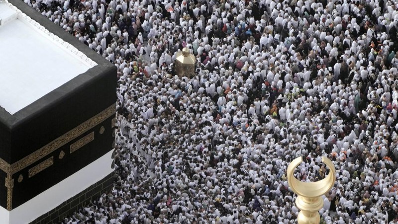 Muslim pilgrims circumambulate around the Kaaba, the cubic building at the Grand Mosque, during the annual hajj pilgrimage, in Mecca, Saudi Arabia, Thursday, June 22, 2023. Muslim pilgrims are converging on Saudi Arabia's holy city of Mecca for the largest hajj since the coronavirus pandemic severely curtailed access to one of Islam's five pillars. (AP Photo/Amr Nabil)