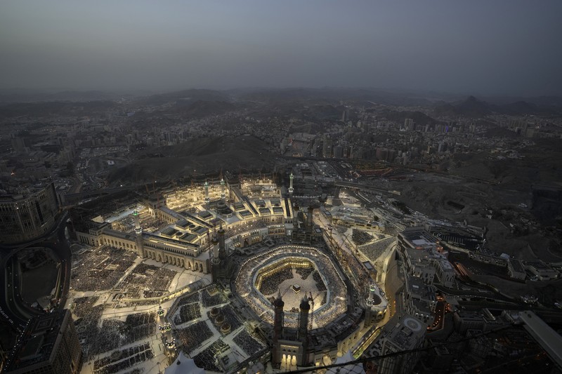Saudi Arabia Hajj Muslim pilgrims circumambulate around the Kaaba, the cubic building at the Grand Mosque, during the annual hajj pilgrimage, in Mecca, Saudi Arabia, Thursday, June 22, 2023. Muslim pilgrims are converging on Saudi Arabia's holy city of Mecca for the largest hajj since the coronavirus pandemic severely curtailed access to one of Islam's five pillars. (AP Photo/Amr Nabil)