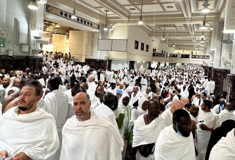 Muslim pilgrims circumambulate around the Kaaba, the cubic building at the Grand Mosque, during the annual hajj pilgrimage, in Mecca, Saudi Arabia, Thursday, June 22, 2023. Muslim pilgrims are converging on Saudi Arabia's holy city of Mecca for the largest hajj since the coronavirus pandemic severely curtailed access to one of Islam's five pillars. (AP Photo/Amr Nabil)