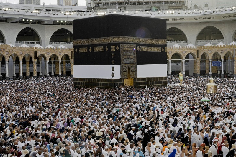 Saudi Arabia Hajj Muslim pilgrims circumambulate around the Kaaba, the cubic building at the Grand Mosque, during the annual hajj pilgrimage, in Mecca, Saudi Arabia, Thursday, June 22, 2023. Muslim pilgrims are converging on Saudi Arabia's holy city of Mecca for the largest hajj since the coronavirus pandemic severely curtailed access to one of Islam's five pillars. (AP Photo/Amr Nabil)