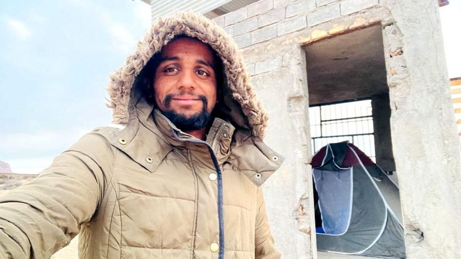 A Pakistani student, Usman Arshad, who walked 5400km from his home town, Okra, Pakistan to Mecca, Saudi Arabia to perform Haj, greets his family before heading out on his journey from Okra, Pakistan, in this handout photo obtained by Reuters on June 23, 2023. Usman Arshad/Handout via REUTERS ATTENTION EDITORS - THIS PICTURE WAS PROVIDED BY A THIRD PARTY