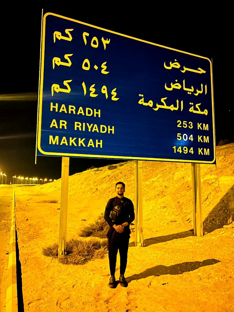 A Pakistani student, Usman Arshad, who walked 5400km from his home town, Okra, Pakistan to Mecca, Saudi Arabia to perform Haj, greets his family before heading out on his journey from Okra, Pakistan, in this handout photo obtained by Reuters on June 23, 2023. Usman Arshad/Handout via REUTERS ATTENTION EDITORS - THIS PICTURE WAS PROVIDED BY A THIRD PARTY