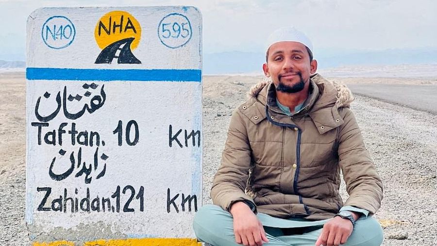 A Pakistani student, Usman Arshad, who walked 5400km from his home town, Okra, Pakistan to Mecca, Saudi Arabia to perform Haj, greets his family before heading out on his journey from Okra, Pakistan, in this handout photo obtained by Reuters on June 23, 2023. Usman Arshad/Handout via REUTERS ATTENTION EDITORS - THIS PICTURE WAS PROVIDED BY A THIRD PARTY
