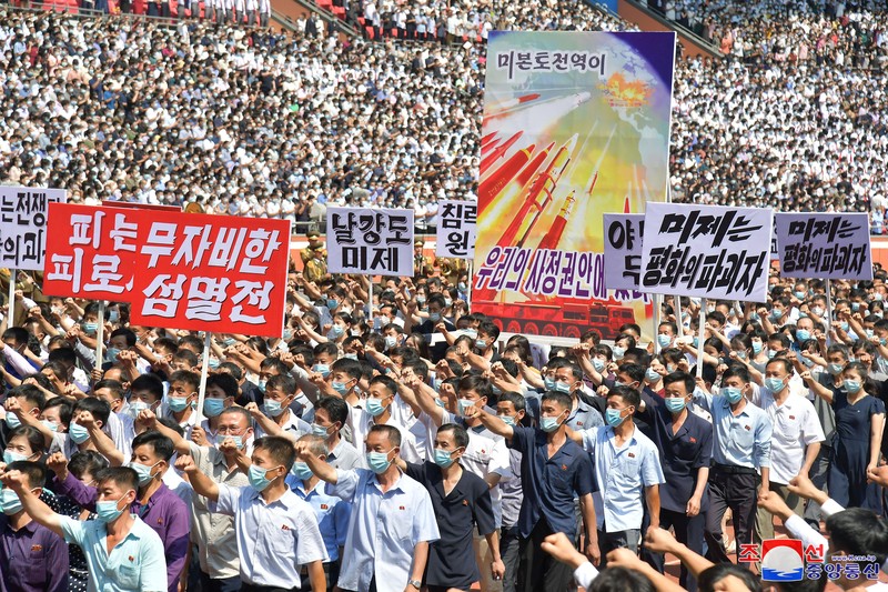 NORTHKOREA-USA/ People attend a mass rally denouncing the U.S. in Pyongyang, North Korea, June 25, 2023 in this photo released by North Korea's Korean Central News Agency (KCNA). KCNA via REUTERS ATTENTION EDITORS - THIS IMAGE WAS PROVIDED BY A THIRD PARTY. REUTERS IS UNABLE TO INDEPENDENTLY VERIFY THIS IMAGE. NO THIRD PARTY SALES. SOUTH KOREA OUT. NO COMMERCIAL OR EDITORIAL SALES IN SOUTH KOREA.