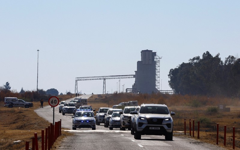 Smoke, believed to be methane gas, is seen at Virginia mine, a disused mine where a methane gas explosion killed at least 31 people last month, in Welkom, South Africa, June 26, 2023. REUTERS/Shafiek Tasiem