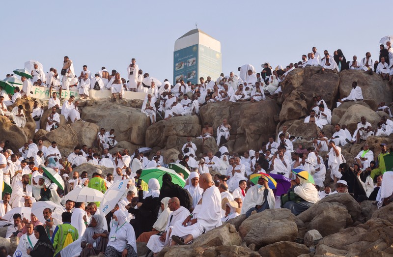 SAUDI-HAJ/ARAFAT-PRAYER Muslim pilgrims gather on the Mount of Mercy at the plain of Arafat during the annual haj pilgrimage, outside the holy city of Mecca, Saudi Arabia, June 27, 2023. REUTERS/Mohamed Abd El Ghany