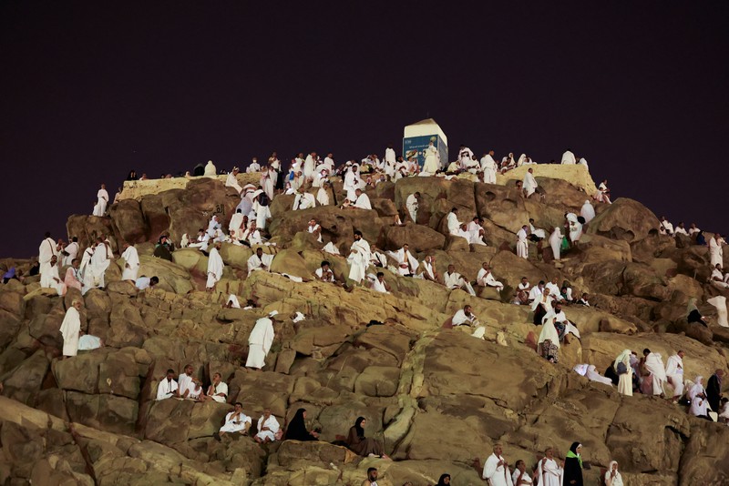 Muslim pilgrims gather on the Mount of Mercy at the plain of Arafat during the annual haj pilgrimage, outside the holy city of Mecca, Saudi Arabia, June 27, 2023. REUTERS/Mohamed Abd El Ghany