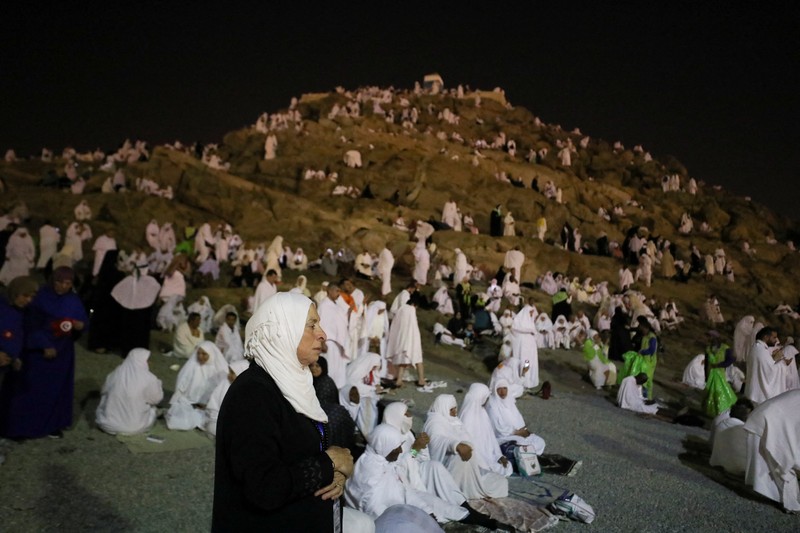 SAUDI-HAJ/ARAFAT-PRAYER Muslim pilgrims gather on the Mount of Mercy at the plain of Arafat during the annual haj pilgrimage, outside the holy city of Mecca, Saudi Arabia, June 27, 2023. REUTERS/Mohamed Abd El Ghany