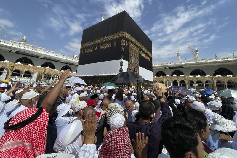 Muslim pilgrims circumambulate the Kaaba, the cubic building at the Grand Mosque, during the annual Hajj pilgrimage, in Mecca, Saudi Arabia, Saturday, July 1, 2023. (AP Photo/Amr Nabil)