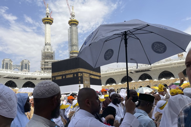 Muslim pilgrims circumambulate the Kaaba, the cubic building at the Grand Mosque, during the annual Hajj pilgrimage, in Mecca, Saudi Arabia, Saturday, July 1, 2023. (AP Photo/Amr Nabil)