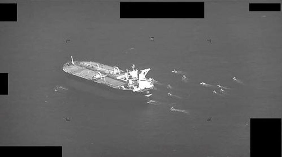 This US Navy handout screenshot of a video shows fast-attack craft from Irans Islamic Revolutionary Guard Corps Navy swarming Panama-flagged oil tanker Niovi as it transits the Strait of Hormuz on May 3, 2023. Iranian forces seized a Panama-flagged oil tanker in the Strait of Hormuz early today, the US Navy said, the second such incident in less than a week. (Photo by NAVCENT Public Affairs / US NAVY / AFP) / RESTRICTED TO EDITORIAL USE - MANDATORY CREDIT