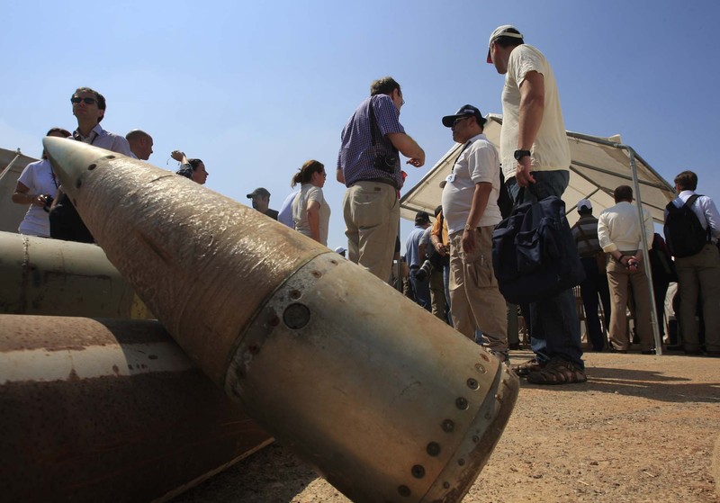 Mideast Yemen War Crimes Questions In this Oct. 5, 2016 photo, a Yemeni man displays an American-made CBU 58A/B, cluster bomb, in a police compound in Sanaa, Yemen. In the air campaign by Saudi Arabia and its allies against Yemen’s Shiite rebels, rights experts say there has been a pattern by the Saudi-led coalition in depending on faulty intelligence, failing to distinguish between civilian and military targets and disregarding the likelihood of civilian casualties. Experts say some of the strikes likely amount to war crimes. (AP Photo/Hani Mohammed)