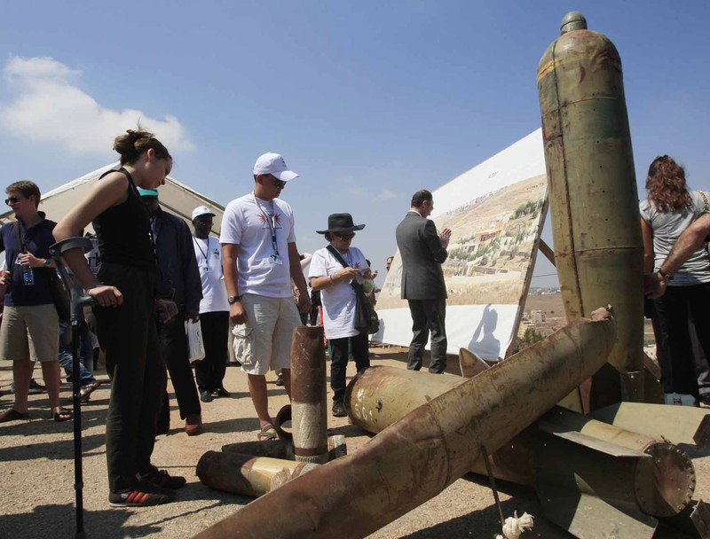 Mideast Yemen War Crimes Questions In this Oct. 5, 2016 photo, a Yemeni man displays an American-made CBU 58A/B, cluster bomb, in a police compound in Sanaa, Yemen. In the air campaign by Saudi Arabia and its allies against Yemen’s Shiite rebels, rights experts say there has been a pattern by the Saudi-led coalition in depending on faulty intelligence, failing to distinguish between civilian and military targets and disregarding the likelihood of civilian casualties. Experts say some of the strikes likely amount to war crimes. (AP Photo/Hani Mohammed)