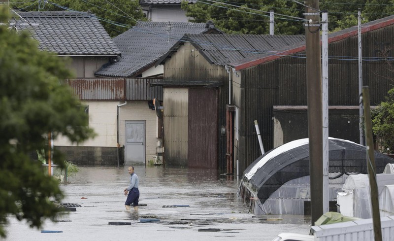 Banjir dan tanah longsor akibat hujan lebat landa Perfektur Saga, Jepang, Senin (10/7/2023). (Kyodo News via AP)