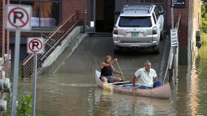 Banjir landa Richmond, Vermont, Amerika Serikat. (AP Photo/Steven Senne)