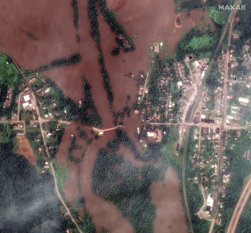 Banjir landa Richmond, Vermont, Amerika Serikat. (AP Photo/Steven Senne) Banjir landa Richmond, Vermont, Amerika Serikat. (AP Photo/Steven Senne)