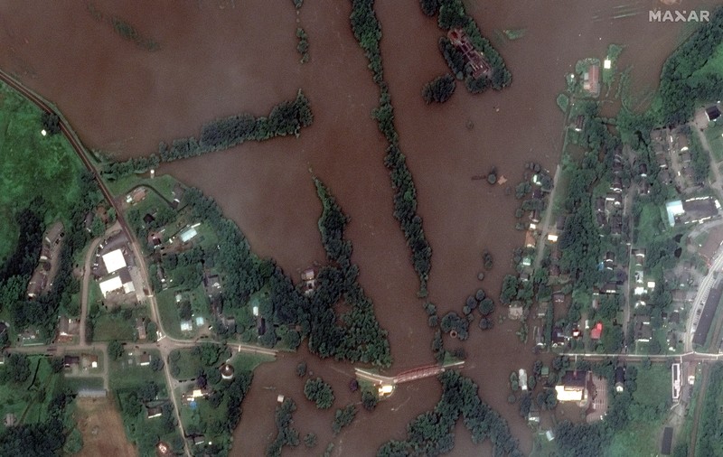 Banjir landa Richmond, Vermont, Amerika Serikat. (AP Photo/Steven Senne) Banjir landa Richmond, Vermont, Amerika Serikat. (AP Photo/Steven Senne)