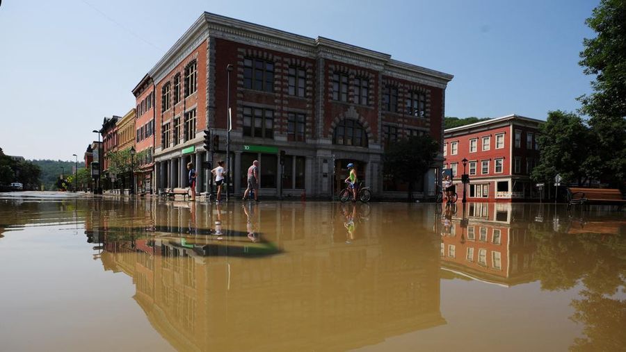Banjir landa Richmond, Vermont, Amerika Serikat. (AP Photo/Steven Senne)