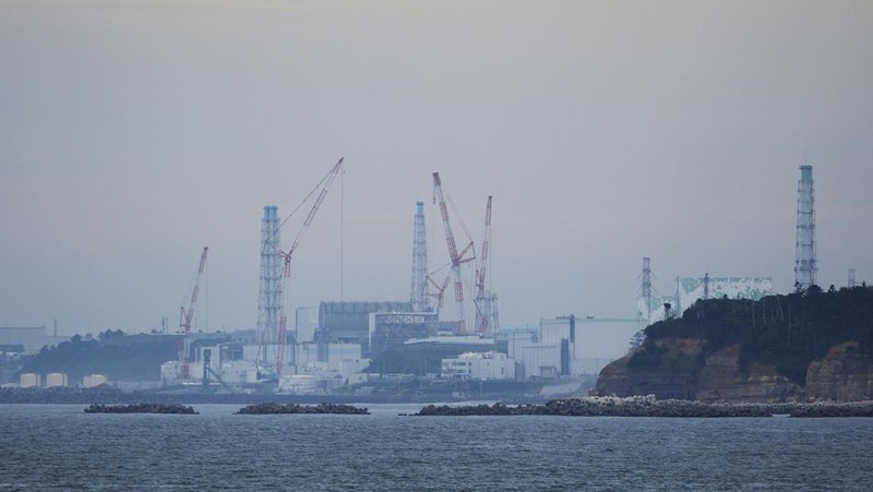 This photo taken during a tour for The Associated Press shows a blue pipeline to transport seawater, part of the facility for the release of treated radioactive water to sea from the Fukushima Daiichi nuclear power plant, operated by Tokyo Electric Power Company Holdings, also known as TEPCO, in Futaba town, northeastern Japan, Friday, July 14, 2023. (AP Photo/Hiro Komae)