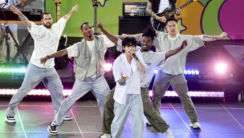 South Korean singer Jung Kook, center, from the K-pop band BTS performs solo on ABC's 