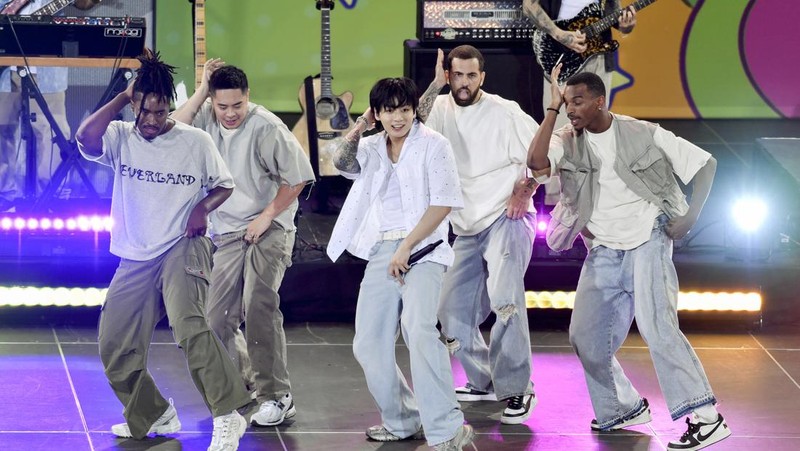 South Korean singer Jung Kook, center, from the K-pop band BTS performs solo on ABC's 