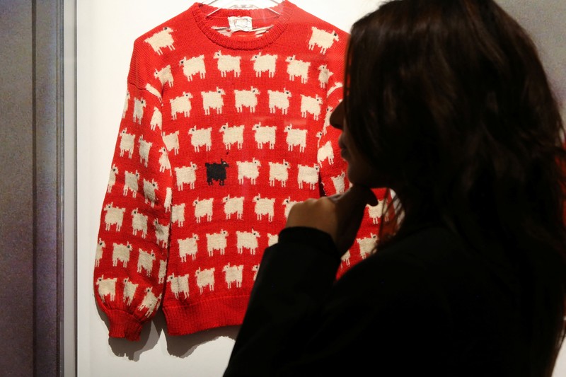 BRITAIN-DIANA/AUCTION A 'black sheep' jumper worn by the Britain's late Diana, Princess of Wales, is displayed at Sotheby's, in London, Britain, July 17, 2023. The jumper, which is to go up for auction, was worn by Diana on several occasions, and was recently rediscovered in a box in the attic of the manufacturers along with correspondence from Diana's private secretary. REUTERS/Rachel Adams