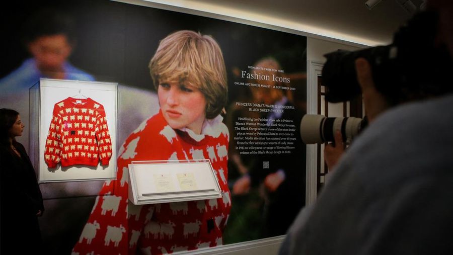 A 'black sheep' jumper worn by the Britain's late Diana, Princess of Wales, is displayed at Sotheby's, in London, Britain, July 17, 2023. The jumper, which is to go up for auction, was worn by Diana on several occasions, and was recently rediscovered in a box in the attic of the manufacturers along with correspondence from Diana's private secretary. REUTERS/Rachel Adams
