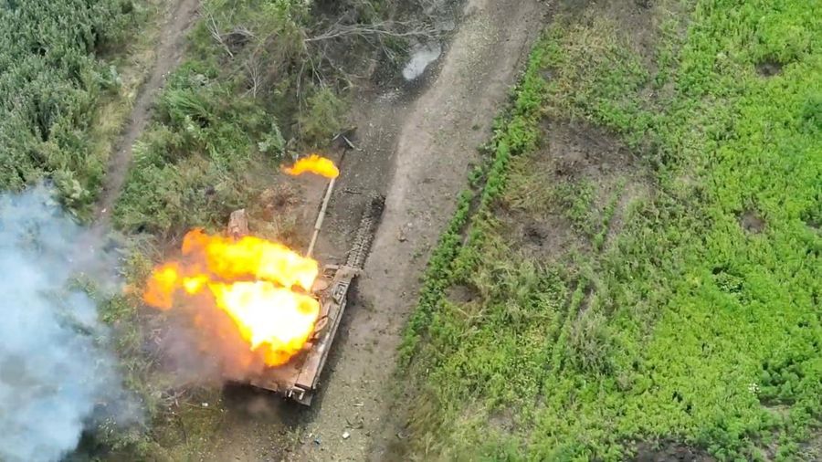 Drone footage shows a tank on fire after it was hit by ammunition from the air, amid Russia's attack on Ukraine, northwest of Bakhmut, Donetsk Region, Ukraine, in this still image from a video released by the Ukrainian army July 15, 2023. Aerial Reconnaissance of 420th Battalion of 57th Mechanized Brigade/Handout via REUTERS THIS IMAGE HAS BEEN SUPPLIED BY A THIRD PARTY. MANDATORY CREDIT