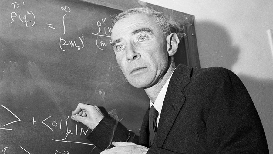 FILE - Dr. J. Robert Oppenheimer, creator of the atom bomb, is shown at his study at the Institute for Advanced Study, in Princeton, N.J., Dec. 15, 1957. A new film on Oppenheimer's life and his role in the development of the atomic bomb as part of the Manhattan Project during World War II opens in theaters on Friday, July 21, 2023.   (AP Photo/John Rooney, File)