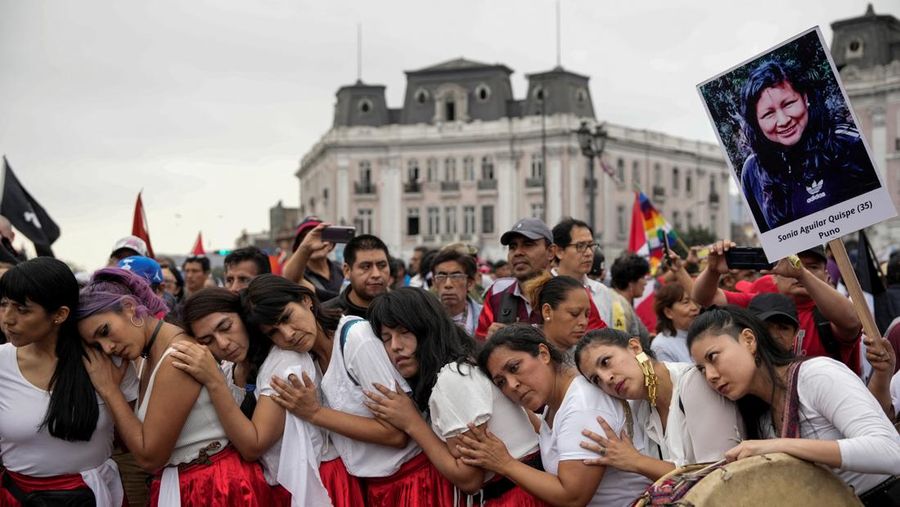 Anti-government protesters clash with police in downtown Lima, Peru, Wednesday, July 19, 2023. The protesters are demanding that Peruvian President Dina Boluarte call for immediate presidential elections as well as justice for those who were killed during protests after the ouster of her predecessor Pedro Castillo. (AP Photo/Rodrigo Abd)