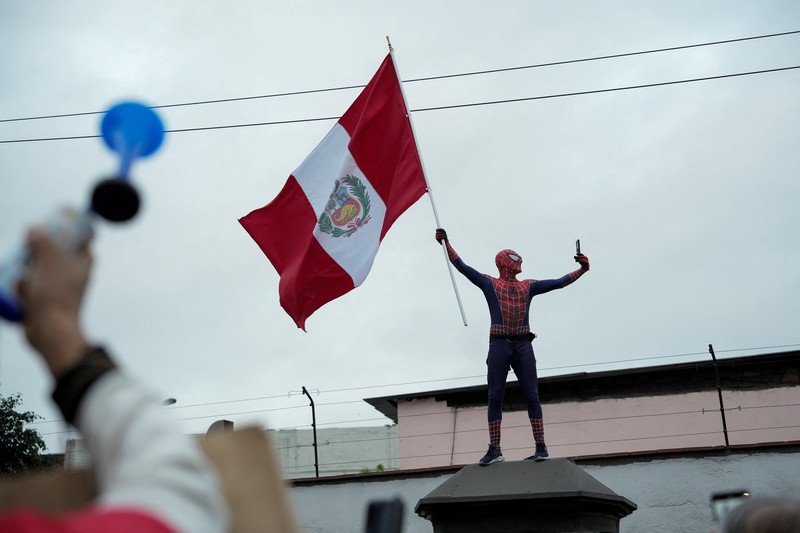 Anti-government protesters clash with police in downtown Lima, Peru, Wednesday, July 19, 2023. The protesters are demanding that Peruvian President Dina Boluarte call for immediate presidential elections as well as justice for those who were killed during protests after the ouster of her predecessor Pedro Castillo. (AP Photo/Rodrigo Abd)