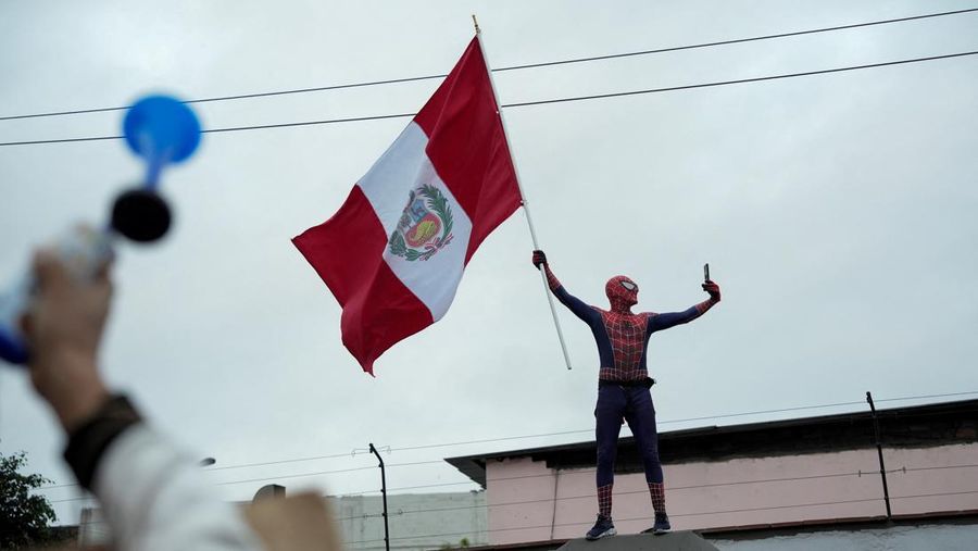Anti-government protesters clash with police in downtown Lima, Peru, Wednesday, July 19, 2023. The protesters are demanding that Peruvian President Dina Boluarte call for immediate presidential elections as well as justice for those who were killed during protests after the ouster of her predecessor Pedro Castillo. (AP Photo/Rodrigo Abd)