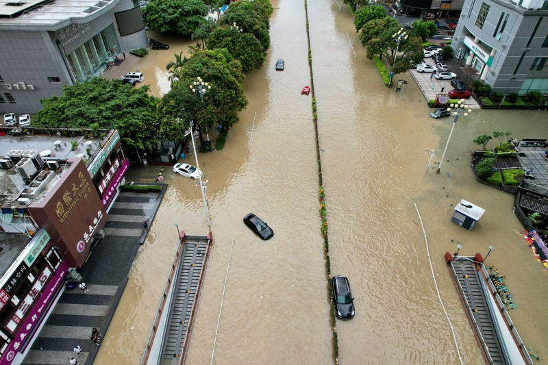 Foto udara menampilkan banjir akibat Topan Doksuri dan hujan lebat di Provisi Fujian, China, Sabtu (29/7/2023). (cnsphoto via REUTERS) Foto udara menampilkan banjir akibat Topan Doksuri dan hujan lebat di Provisi Fujian, China, Sabtu (29/7/2023). (cnsphoto via REUTERS)
