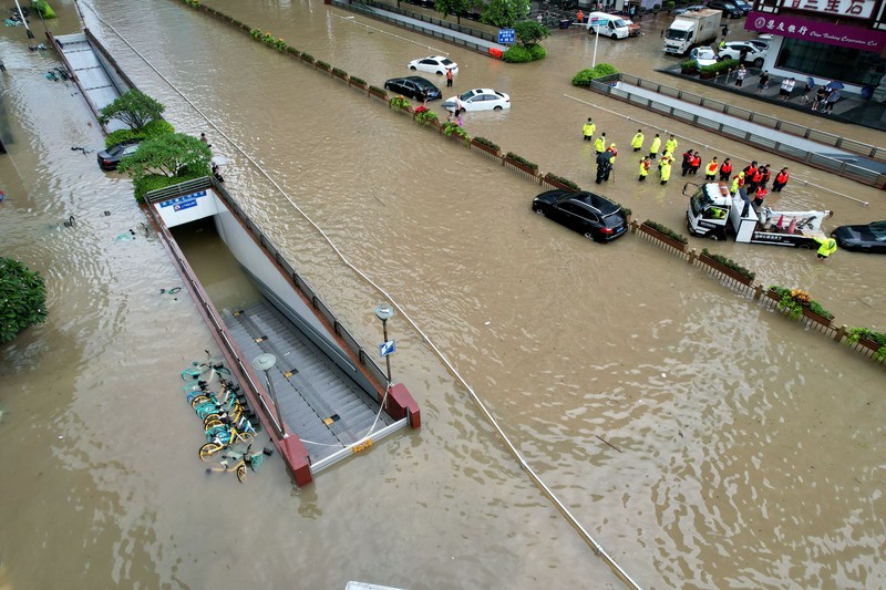 Foto udara menampilkan banjir akibat Topan Doksuri dan hujan lebat di Provisi Fujian, China, Sabtu (29/7/2023). (cnsphoto via REUTERS) Foto udara menampilkan banjir akibat Topan Doksuri dan hujan lebat di Provisi Fujian, China, Sabtu (29/7/2023). (cnsphoto via REUTERS)