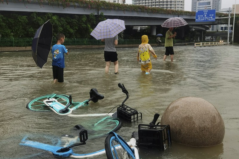 Foto udara menampilkan banjir akibat Topan Doksuri dan hujan lebat di Provisi Fujian, China, Sabtu (29/7/2023). (cnsphoto via REUTERS)