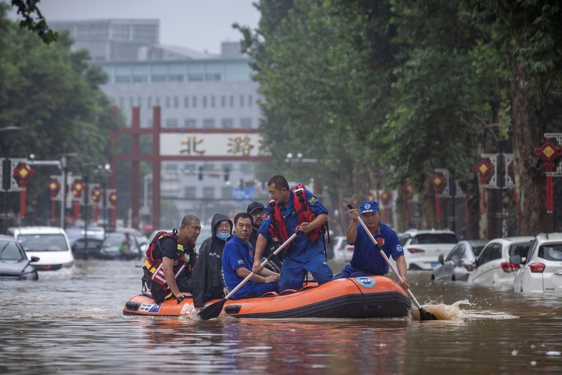 Banjir akibat hujan lebat dan topan doksuri di Beijing, China, Selasa. (1/8/2023). (REUTERS/Thomas Peter) Banjir akibat hujan lebat dan topan doksuri di Beijing, China, Selasa. (1/8/2023). (REUTERS/Thomas Peter)