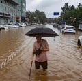 Petaka Sapu Asia: Jepang-Korsel 'Terbakar', China 'Tenggelam'
