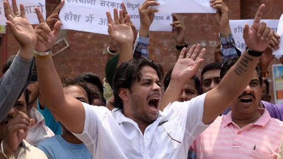 Protestors shout slogans during a demonstration against the ongoing sectarian riots, in Amritsar on August 2, 2023. Riot police were patrolling urban neighbourhoods near India's capital on August 2 following a second night of sectarian riots that have killed six people so far. (Photo by Narinder NANU / AFP)