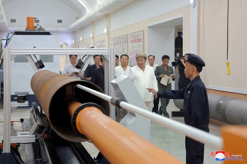 NORTHKOREA-MISSILES/ North Korean leader Kim Jong Un gives field guidance at a major weapon factory in this image released by North Korea's Korean Central News Agency on August 6, 2023. KCNA via REUTERS ATTENTION EDITORS - THIS IMAGE WAS PROVIDED BY A THIRD PARTY. REUTERS IS UNABLE TO INDEPENDENTLY VERIFY THIS IMAGE. NO THIRD PARTY SALES. SOUTH KOREA OUT. NO COMMERCIAL OR EDITORIAL SALES IN SOUTH KOREA.