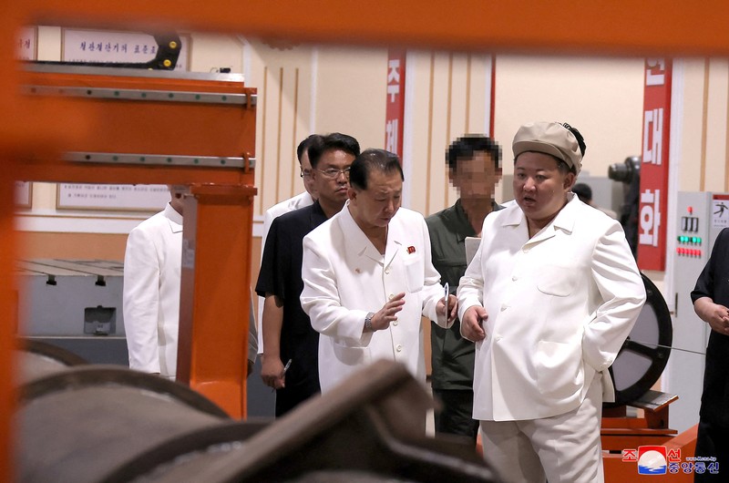 NORTHKOREA-MISSILES/ North Korean leader Kim Jong Un gives field guidance at a major weapon factory in this image released by North Korea's Korean Central News Agency on August 6, 2023. KCNA via REUTERS ATTENTION EDITORS - THIS IMAGE WAS PROVIDED BY A THIRD PARTY. REUTERS IS UNABLE TO INDEPENDENTLY VERIFY THIS IMAGE. NO THIRD PARTY SALES. SOUTH KOREA OUT. NO COMMERCIAL OR EDITORIAL SALES IN SOUTH KOREA.