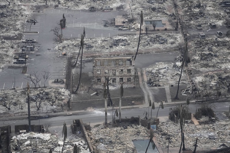 Hawaii Wildfires Impacts FILE - Wildfire devastation is seen outside the city Lahaina, Hawaii, Aug. 10, 2023. Experts say the fires are likely to transform the landscape in unwanted ways, hasten erosion, send sediment into waterways and degrade coral that’s critically important to the islands, marine life and people who live near it. (AP Photo/Rick Bowmer, File)