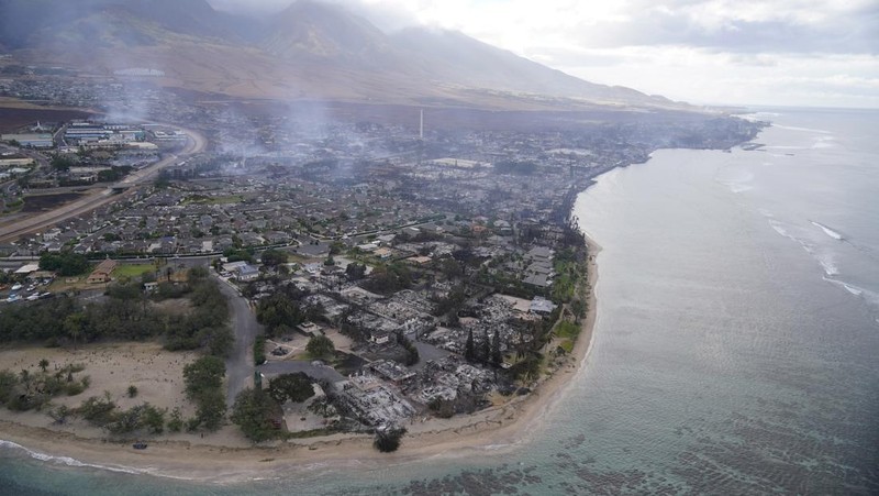 FILE - Wildfire devastation is seen outside the city Lahaina, Hawaii, Aug. 10, 2023. Experts say the fires are likely to transform the landscape in unwanted ways, hasten erosion, send sediment into waterways and degrade coral that’s critically important to the islands, marine life and people who live near it. (AP Photo/Rick Bowmer, File)