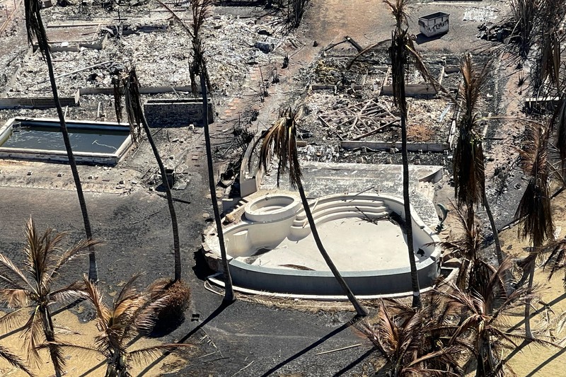 Cangkang rumah dan bangunan yang terbakar tersisa setelah kebakaran hutan yang didorong oleh angin kencang membakar sebagian besar kota di Lahaina, Maui, Hawaii, AS 11 Agustus 2023. Cangkang rumah dan bangunan yang terbakar tersisa setelah kebakaran hutan yang didorong oleh angin kencang membakar sebagian besar kota di Lahaina, Maui, Hawaii, AS 11 Agustus 2023. (Hawai'i Department of Land and Natural Resources/Handout via REUTERS)
