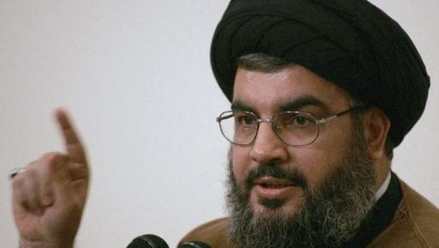 Hezbollah chief Sheikh Hassan Nasrrallah speaks during the opening session of the fourth general Arab conference to back the Lebanese and Palestinian resistance , 30 March 2006 in Beirut. AFP PHOTO/RAMZI HAYDAR (Photo by RAMZI HAIDAR / AFP)