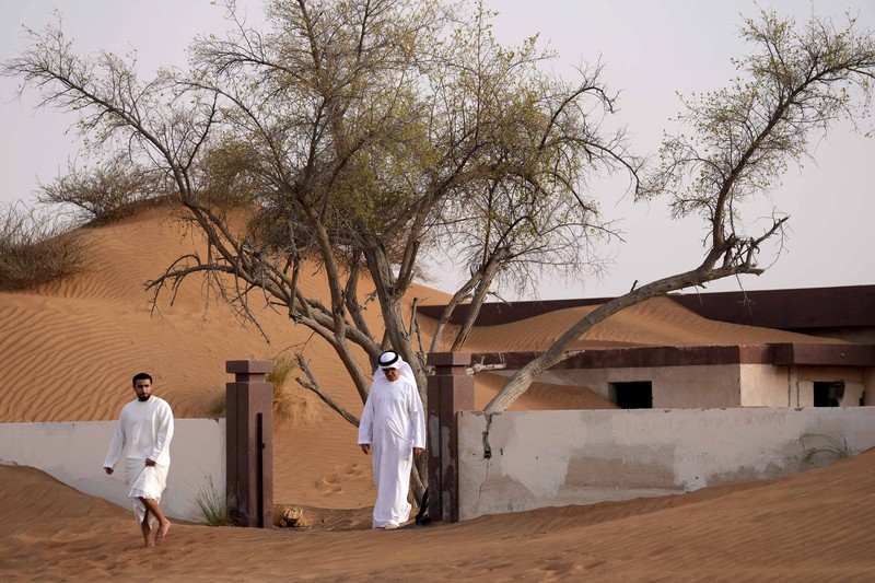 Desa Al Madam yang tertimbun pasir dan ditinggalkan penghuninya di Uni Emirat Arab. (AP Photo/Kamran Jebreili) Desa Al Madam yang tertimbun pasir dan ditinggalkan penghuninya di Uni Emirat Arab. (AP Photo/Kamran Jebreili)