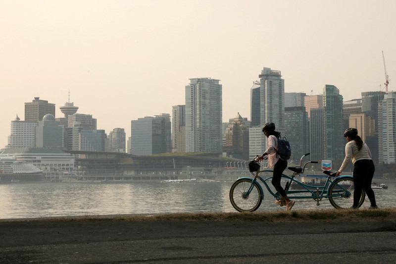 Suasana pusat kota yang diselimuti kabut asap kebakaran hutan, di Stanley Park di Vancouver, British Columbia, Kanada, Senin (21/8/2023). (REUTERS/Chris Helgren) Suasana pusat kota yang diselimuti kabut asap kebakaran hutan, di Stanley Park di Vancouver, British Columbia, Kanada, Senin (21/8/2023). (REUTERS/Chris Helgren)